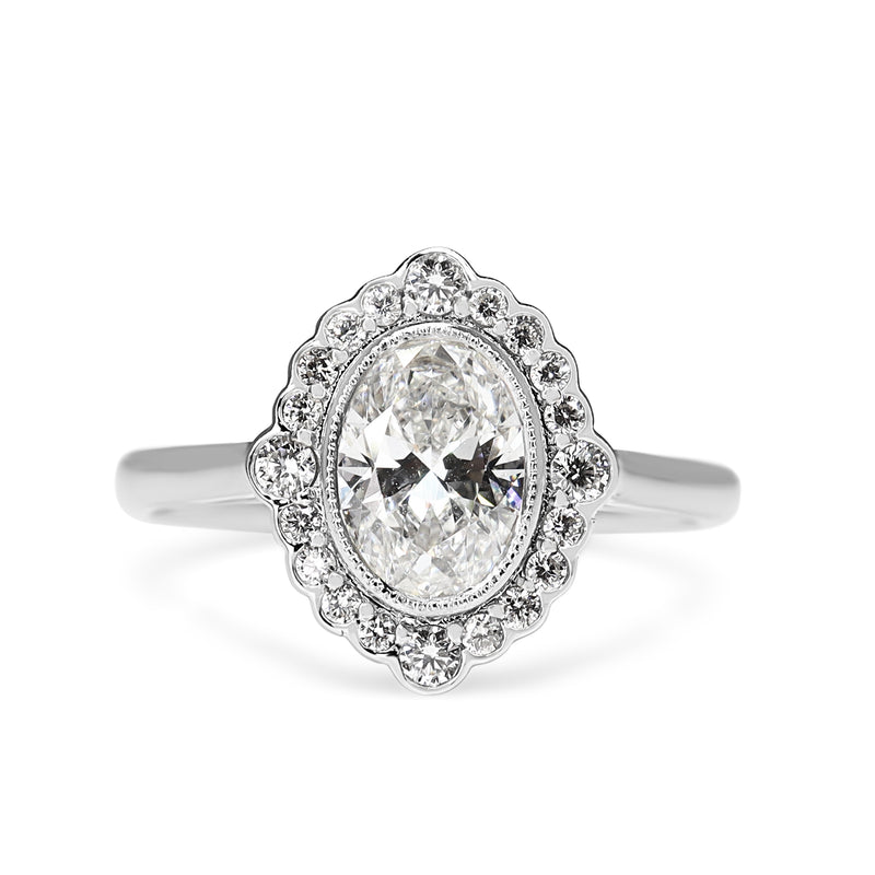 18ct White Gold Oval Diamond Daisy Style Halo Ring