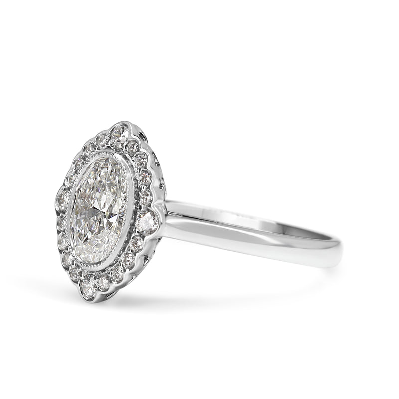 18ct White Gold Oval Diamond Daisy Style Halo Ring