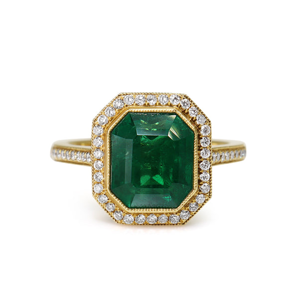 18ct Yellow Gold Emerald and Diamond Halo Ring