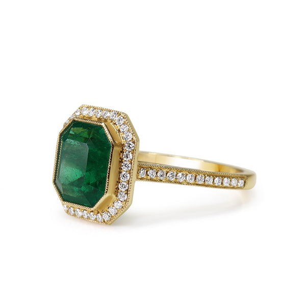 18ct Yellow Gold Emerald and Diamond Halo Ring