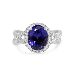 18ct White Gold Tanzanite and Diamond Halo and Twist Ring