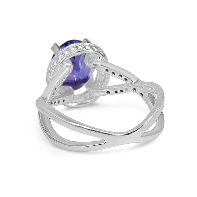 18ct White Gold Tanzanite and Diamond Halo and Twist Ring