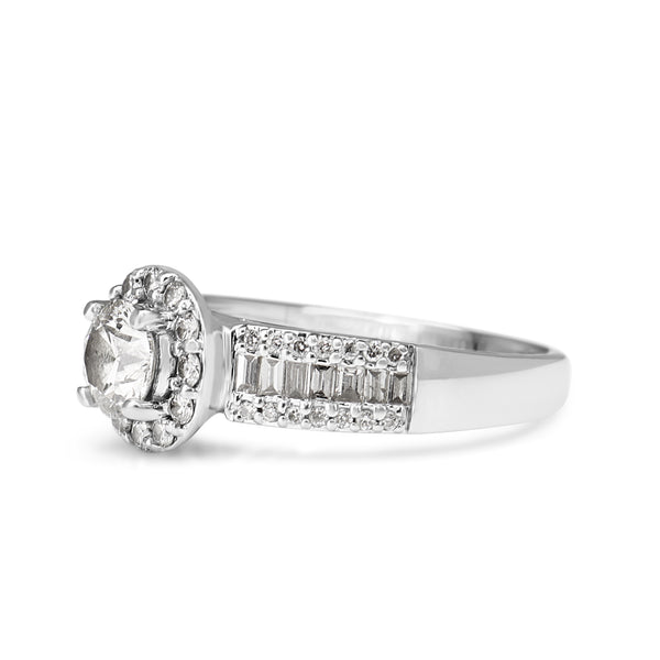 18ct White Gold Halo Cluster Ring With Round and Baguette Diamonds